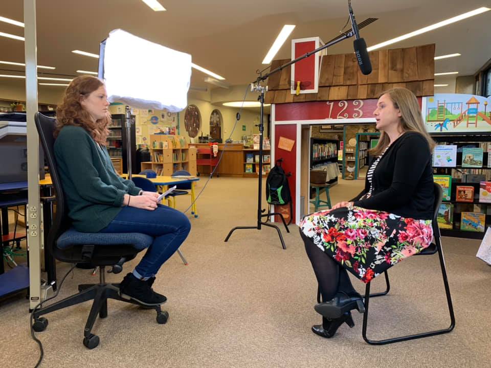 An interview with a light box and boon mike are conducted in the Children's Room at Knox County Public Library