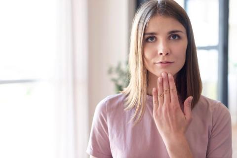 woman doing American Sign Language